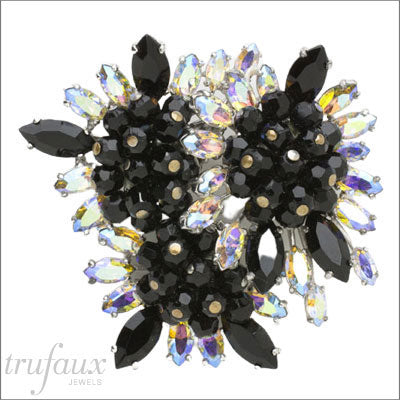Schiaparelli brooch with onyx glass beads & Aurora Borealis